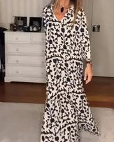 Långärmad lös klänning med V-ringning